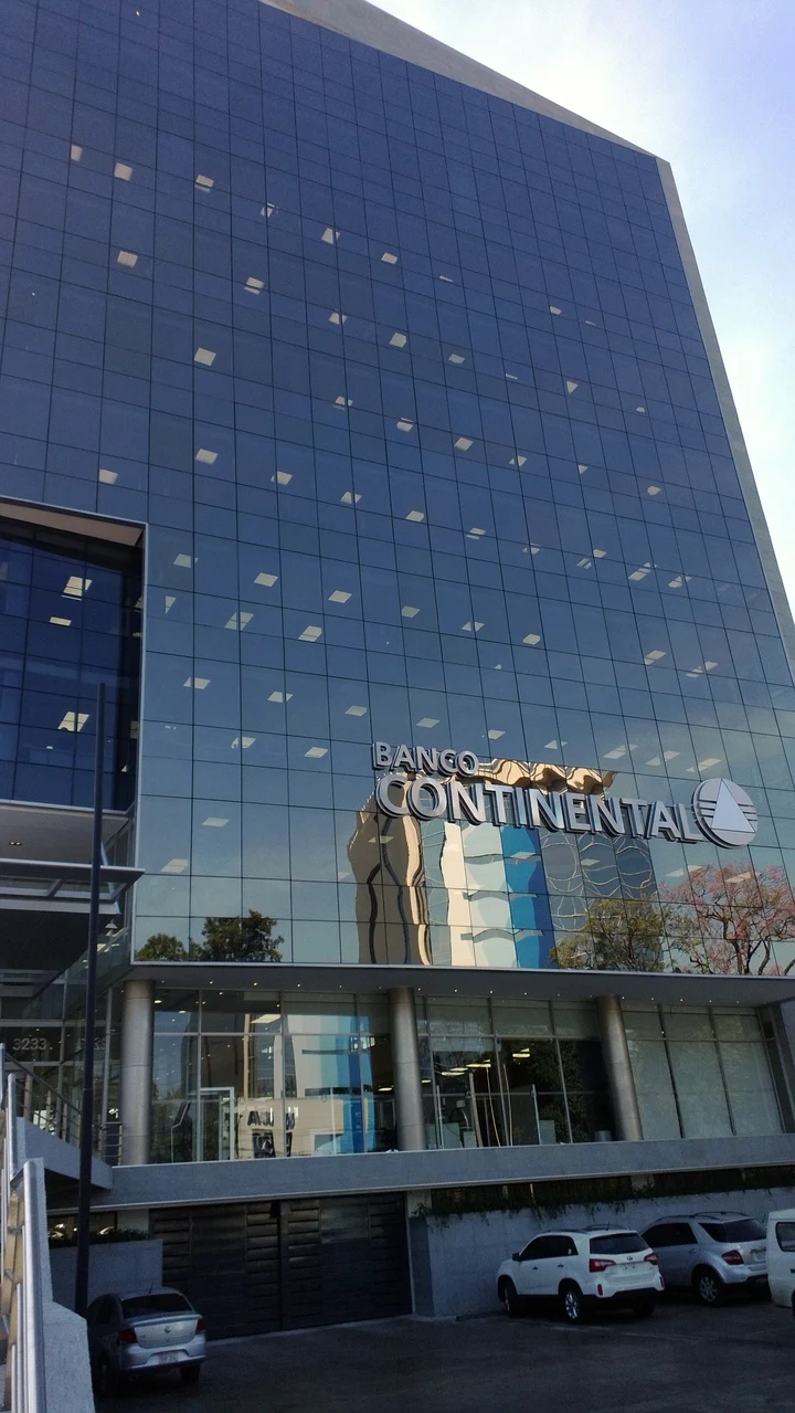Banco Continental’s glass-fronted building and sign in Asunción, photographed in 2014.