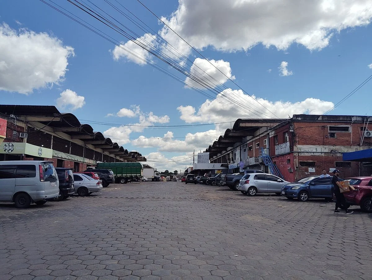 The lane between Blocks A and B. The photograph does not establish today’s traffic conditions.