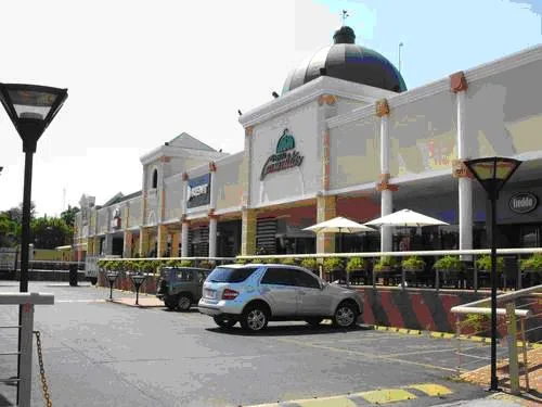 Exterior of the Paseo Carmelitas shopping complex with its signature dome
